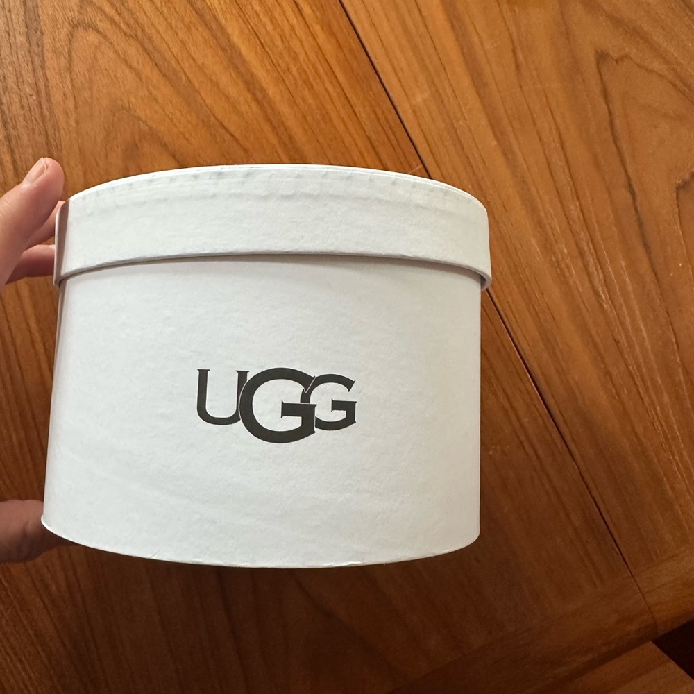 UGG White Round Earmuff Box with Black Logo.  This is the empty box only.